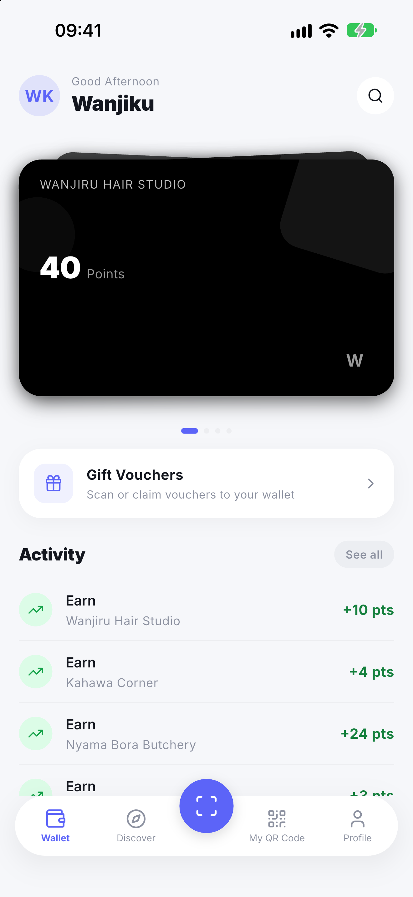 Zawadi Rewards app wallet with a loyalty card, gift vouchers and recent points from three shops